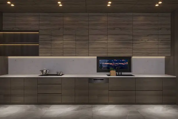 Kitchen with smart appliances integrated into cabinetry and voice-controlled lighting.
