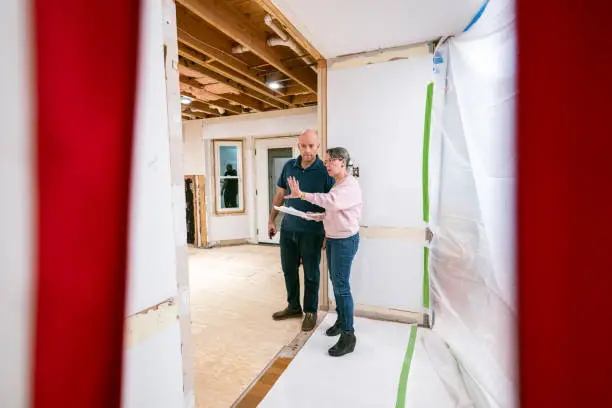 KBR contractor discussing full home remodel in a showroom