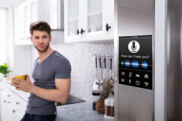 Kitchen and bathroom with smart voice-controlled systems