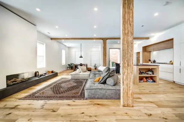 Home with restored water-damaged living space and modern finishes