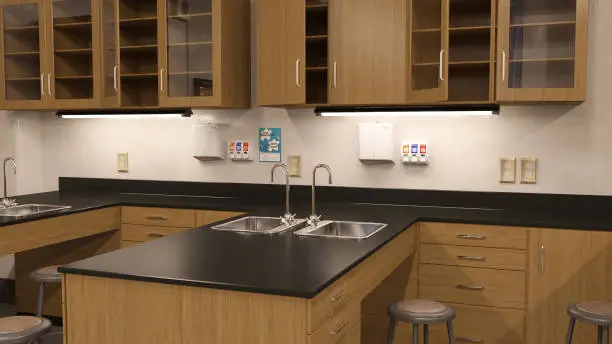 Kitchen with multiple workstations and accessible storage