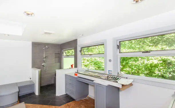 Rebuilt kitchen and bathroom with seamless material replacements
