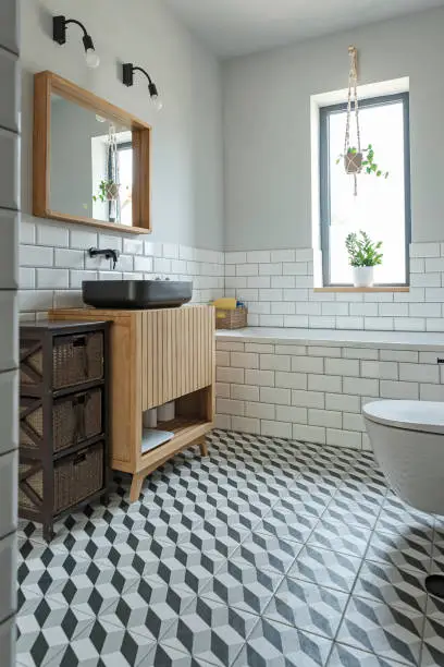 Bathroom with sustainable tiles and reclaimed vanity