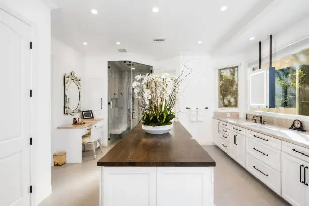 Modern kitchen and spa-inspired bathroom integration