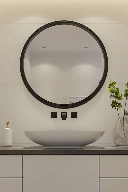 Small bathroom with wall-mounted vanity and LED lighting.