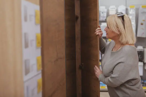 KBR contractor reviewing closet design in a showroom