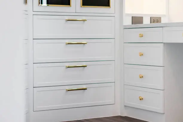 Closet with built-in drawers and premium finishes