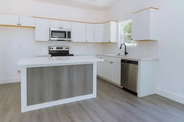 Kitchen with new waterproof flooring and cabinets